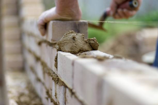 Best Concrete Sidewalk Installation  in Higginsville, MO