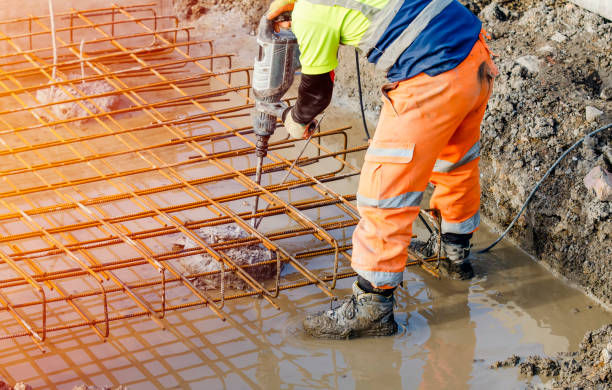 Best Concrete Installation Cost  in Higginsville, MO